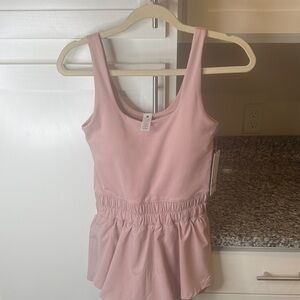 XS Yogalicious Blush Romper w/built in shorts + removeable bra pads with tags.